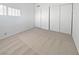 Spacious bedroom with neutral carpet and double door closet at 2736 Taylor Ave, North Las Vegas, NV 89030