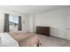 Bright bedroom with a brown comforter and dresser at 2883 Gunnery Forge St, Las Vegas, NV 89156