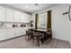 Bright kitchen with white cabinets, stainless steel appliances, and an island at 2883 Gunnery Forge St, Las Vegas, NV 89156