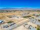 Aerial view of a residential area with houses and desert landscape at 301 E Chevron St, Pahrump, NV 89048