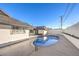 Inviting kidney-shaped pool with surrounding patio at 3517 Spencer St, Las Vegas, NV 89169