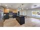 Modern kitchen with stainless steel appliances and breakfast bar at 3517 Spencer St, Las Vegas, NV 89169