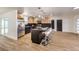 Modern kitchen with island and stainless steel appliances at 3517 Spencer St, Las Vegas, NV 89169