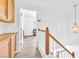 Upstairs hallway with built-in wooden cabinets and linen closet at 355 Seine Way # 1412, Henderson, NV 89014