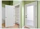 A white door reveals the interior of a shelf lined linen closet at 368 E Rush Ave, Las Vegas, NV 89183