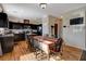 Kitchen with dark cabinets, stainless steel appliances, and an island at 4137 Keasberry Ave, North Las Vegas, NV 89081