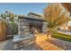 Outdoor stone fireplace perfect for entertaining at 4307 Pageantry Falls Dr, North Las Vegas, NV 89031