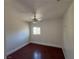 Bright bedroom with hardwood floors and a ceiling fan at 5337 Hacienda Cir, Las Vegas, NV 89120