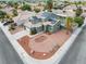 Aerial view of a charming two-story home with desert landscaping and solar panels at 6112 Browning Way, Las Vegas, NV 89130