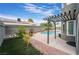 Backyard oasis with pool, pergola, and landscaping at 6112 Browning Way, Las Vegas, NV 89130