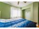 Bedroom with wood floors and built-in shelving at 6112 Browning Way, Las Vegas, NV 89130