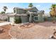 Beautiful home featuring a spacious garage and desert landscaping for a low-maintenance appeal at 6112 Browning Way, Las Vegas, NV 89130