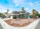 Charming home with desert landscaping and solar panels for energy efficiency, situated on a corner lot at 6112 Browning Way, Las Vegas, NV 89130