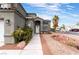 Two-story house with a landscaped front yard and driveway at 6112 Browning Way, Las Vegas, NV 89130