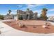 Two-story house with a landscaped front yard and driveway at 6112 Browning Way, Las Vegas, NV 89130