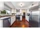 Modern kitchen with stainless steel appliances at 6112 Browning Way, Las Vegas, NV 89130