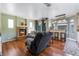 Cozy living room with a fireplace and hardwood floors at 6112 Browning Way, Las Vegas, NV 89130