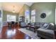 Open living area with dining space and high ceilings at 6112 Browning Way, Las Vegas, NV 89130