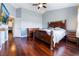 Main bedroom with wood flooring, large windows and a view of another bedroom at 6112 Browning Way, Las Vegas, NV 89130