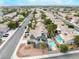 Aerial neighborhood view featuring multiple homes and streets, showcasing a thriving community setting at 6112 Browning Way, Las Vegas, NV 89130