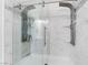Large walk-in shower with multiple shower heads and glass enclosure at 6112 Browning Way, Las Vegas, NV 89130