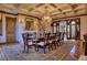 Elegant formal dining room with a large table, chandelier, and hardwood floors at 66 Innisbrook Ave, Las Vegas, NV 89113