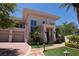 Luxury home with stone pathway and palm trees at 66 Innisbrook Ave, Las Vegas, NV 89113