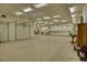 Large garage with ample storage space and workshop area at 66 Innisbrook Ave, Las Vegas, NV 89113