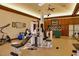 Luxurious home gym with extensive equipment and built-in cabinetry at 66 Innisbrook Ave, Las Vegas, NV 89113