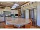 Island kitchen with granite countertops and stainless steel appliances at 66 Innisbrook Ave, Las Vegas, NV 89113