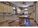 Spacious laundry room with ample cabinet space and a folding table at 66 Innisbrook Ave, Las Vegas, NV 89113