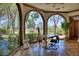 Home office with hardwood floors, large windows, and garden views at 66 Innisbrook Ave, Las Vegas, NV 89113