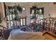 Ornate wrought iron staircase with high ceilings at 66 Innisbrook Ave, Las Vegas, NV 89113