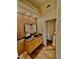 Bathroom with granite vanity and mosaic tile at 6970 Emerald Springs Ln, Las Vegas, NV 89113