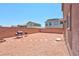 Backyard with gravel and a built in grill at 7906 Woolly St, Las Vegas, NV 89149