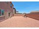Large backyard with gravel and a built in grill at 7906 Woolly St, Las Vegas, NV 89149