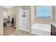 Bathroom with shower, bathtub, and vanity at 7906 Woolly St, Las Vegas, NV 89149