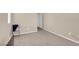 Empty bedroom with closet and chair at 7906 Woolly St, Las Vegas, NV 89149