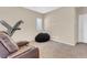 Relaxing bonus room featuring a recliner, treadmill, and beanbag chair at 7906 Woolly St, Las Vegas, NV 89149