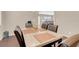 Dining area with table, chairs, and view into living room at 7906 Woolly St, Las Vegas, NV 89149
