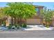 Two-story house with attached garage and landscaping at 7906 Woolly St, Las Vegas, NV 89149