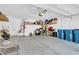 Garage with storage shelves and lots of items at 7906 Woolly St, Las Vegas, NV 89149