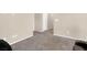 Bright hallway with neutral-toned carpet and access to other rooms at 7906 Woolly St, Las Vegas, NV 89149