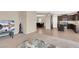 Living room with open floor plan and view of kitchen at 7906 Woolly St, Las Vegas, NV 89149