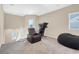 Upstairs loft area with recliner, treadmill, and beanbag chair at 7906 Woolly St, Las Vegas, NV 89149