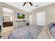 Main bedroom with a king-size bed and an en-suite bathroom at 7906 Woolly St, Las Vegas, NV 89149