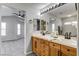 Spacious bathroom with double vanity, and view of bedroom at 8470 Opal Splendor Ave, Las Vegas, NV 89147