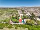 Aerial view of property, showing house, pool, and landscape at 875 Cooper St, Overton, NV 89040