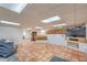 Finished basement with tiled floors and multiple seating areas at 875 Cooper St, Overton, NV 89040