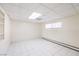 Clean, bright basement room with tile floors and shelving at 875 Cooper St, Overton, NV 89040